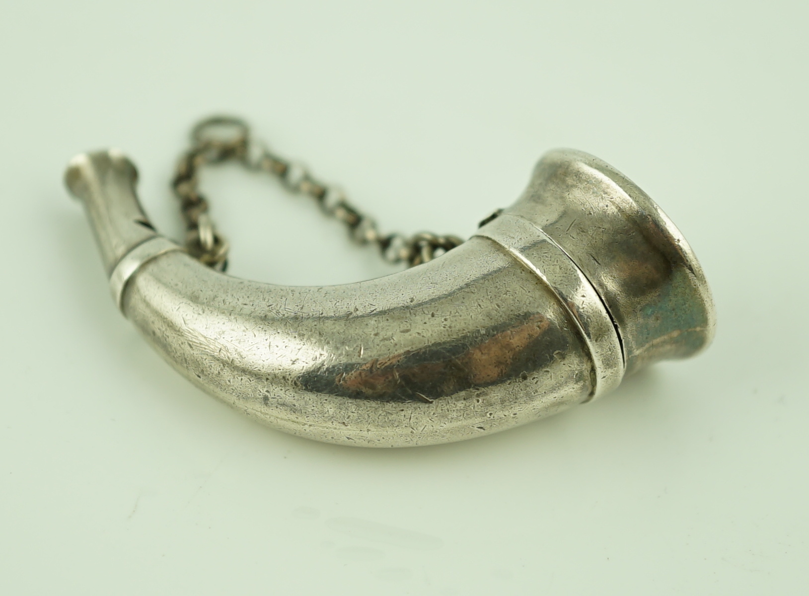 A late Victorian silver combination horn shape vinaigrette and whistle, by Sampson Mordan & Co.